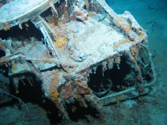 S1 stbd forward 4-inch HA Gun and mount inverted on seabed